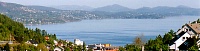 Flott utsikt over byfjorden fra balkongen